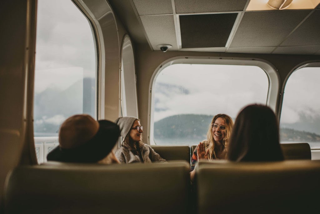 4 women sitting in a ferry cabin